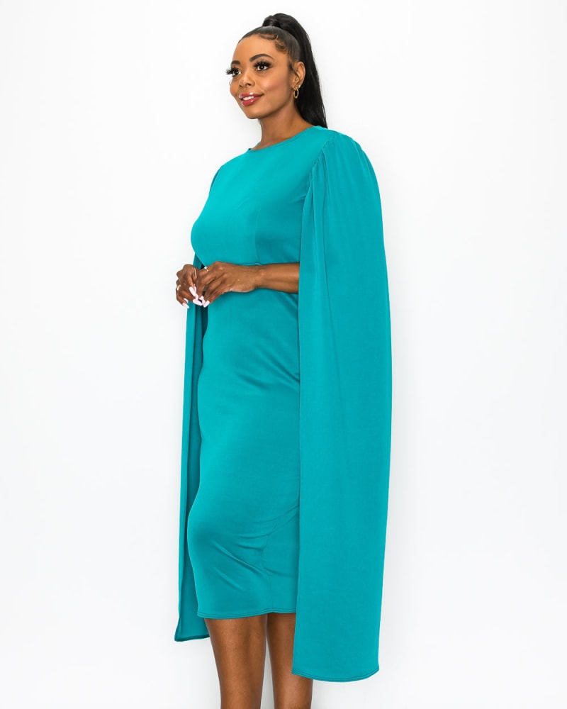 Front of a model wearing a size 1X Naomi Cape Dress in Jade by L I V D. | dia_product_style_image_id:241082